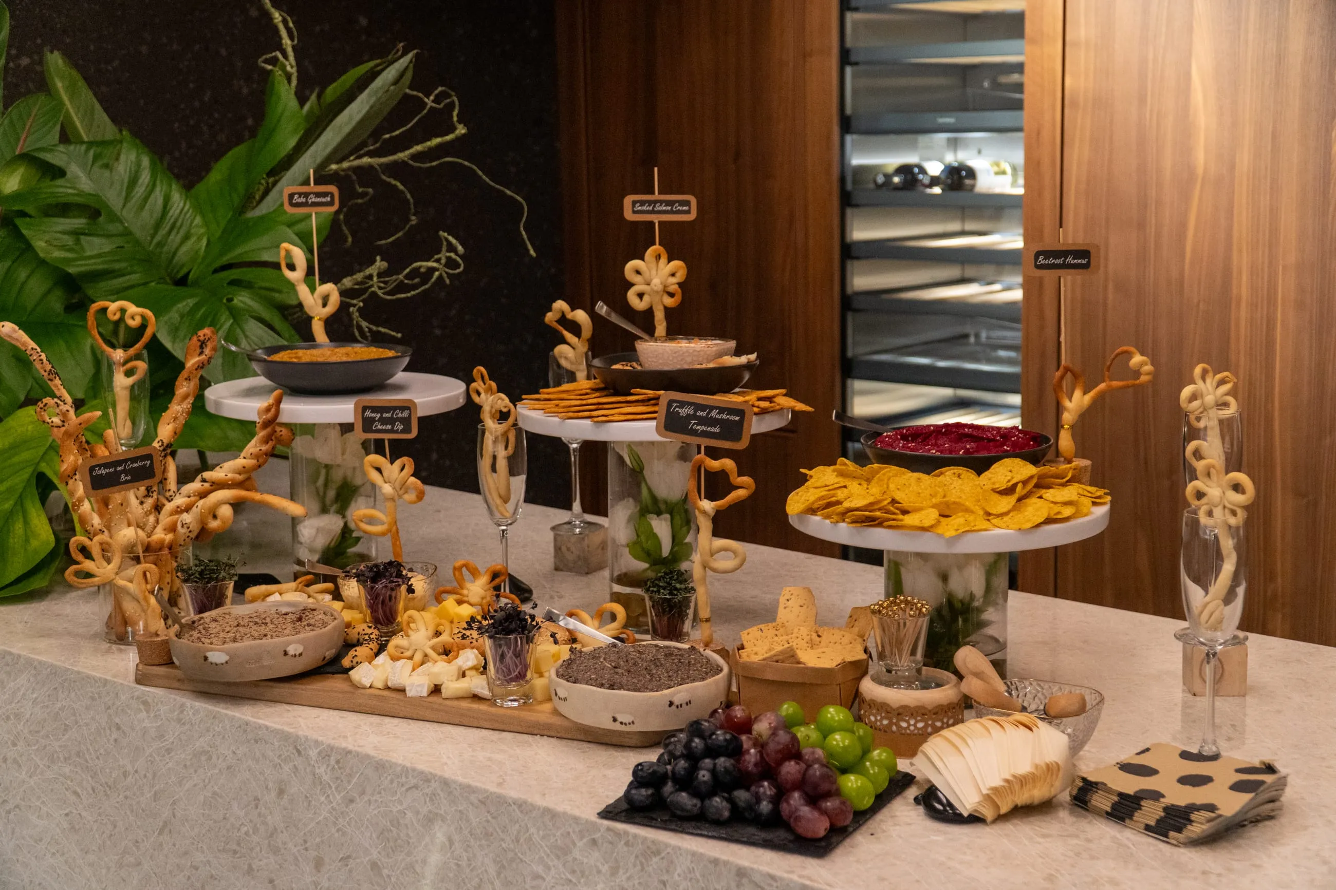 A grazing table laid out against the wine cabinet at a Gaggenau evening